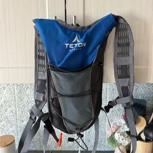 Blue and Gray Hiking/Running pack WITHOUT ACTUAL WATER BLADDER- only pocket